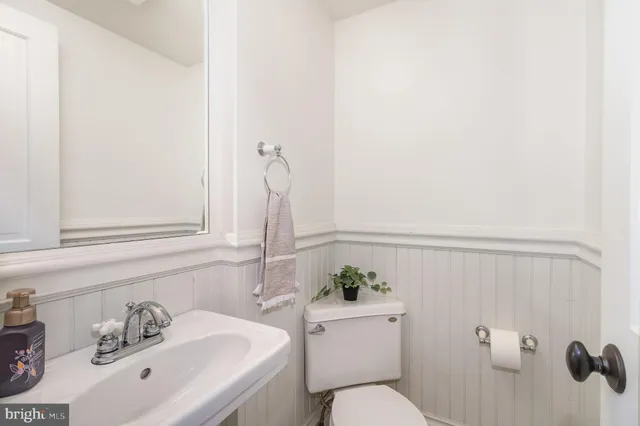 a bathroom with a sink and toilet