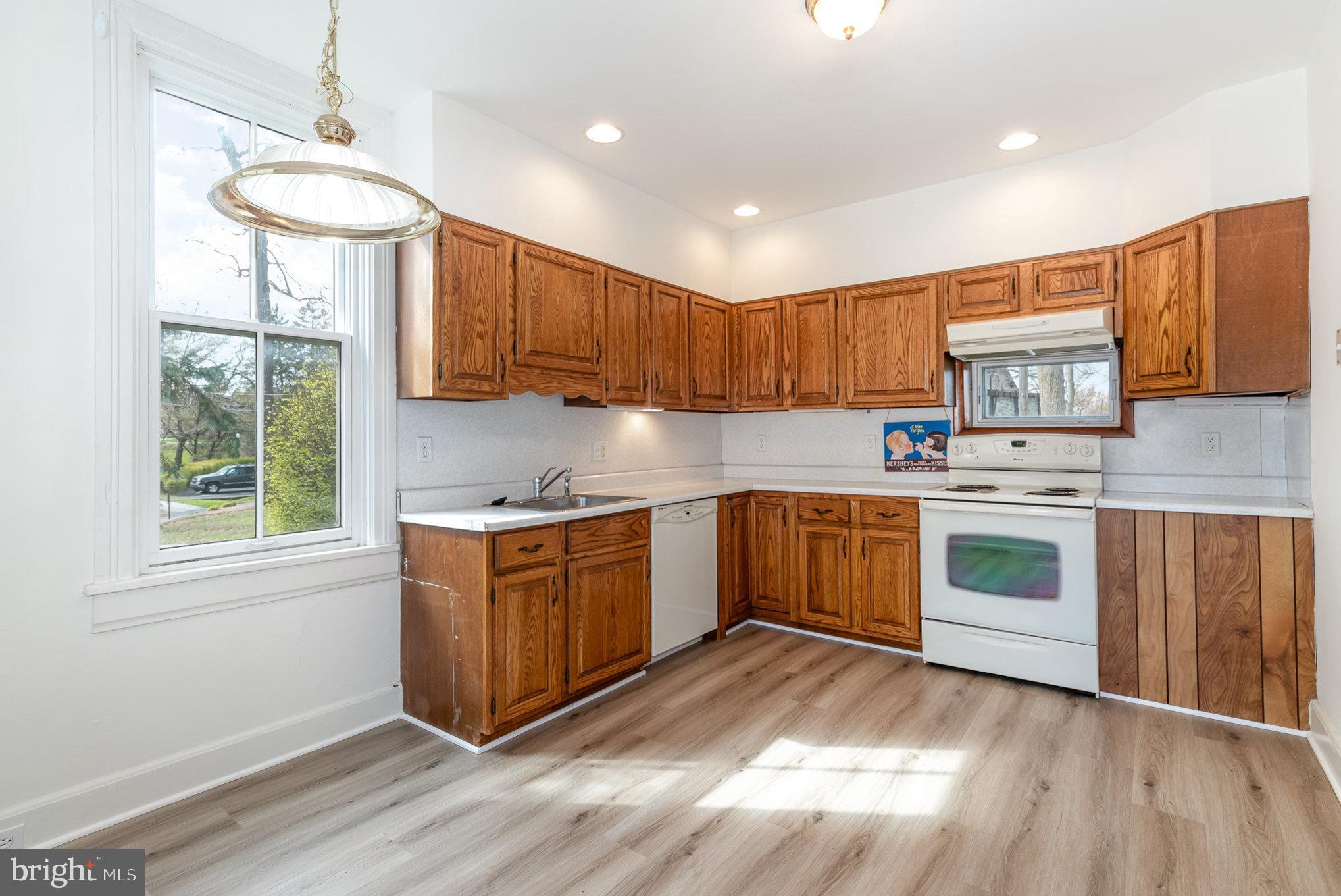 308 East Derry Road Hershey, PA 17033 - Photo 30 of 48 a kitchen with stainless steel appliances granite countertop a stove a sink and a refrigerator