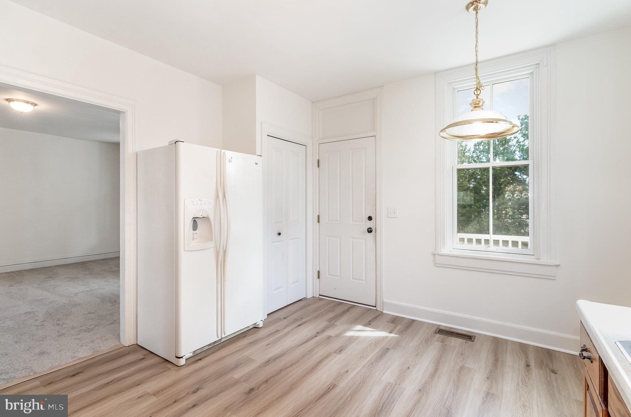 308 East Derry Road Hershey, PA 17033 - Photo 31 of 48 a view of an empty room with wooden floor and a window