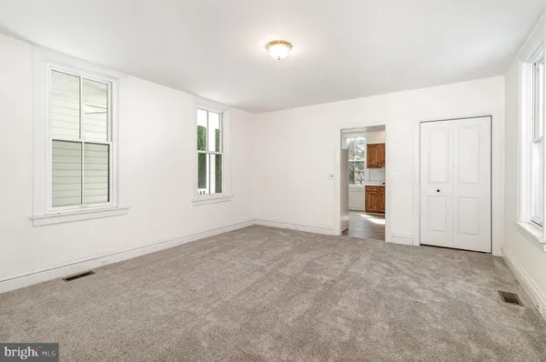 an empty room with windows