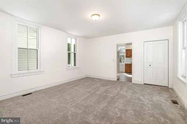 an empty room with windows