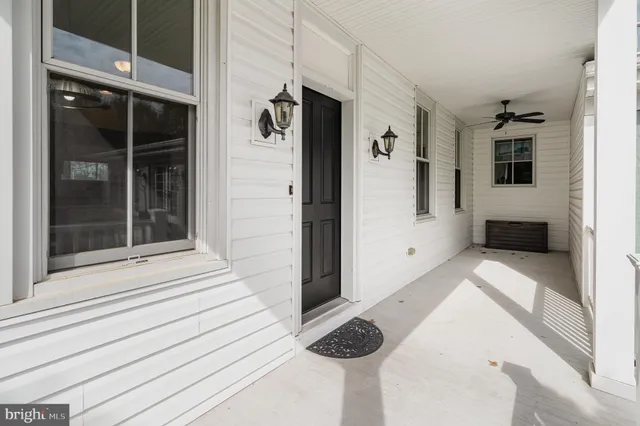 a view of bathroom with tub and shower