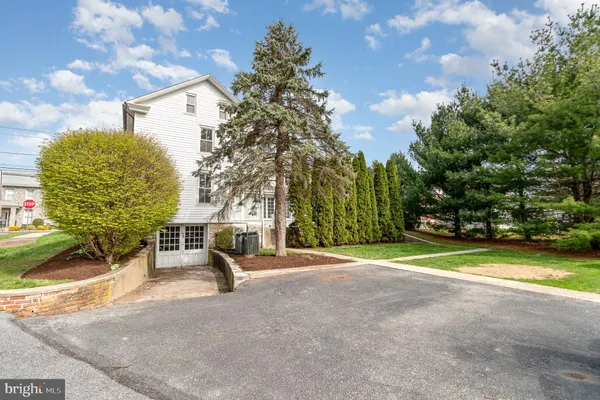 a view of a park with swings and slides