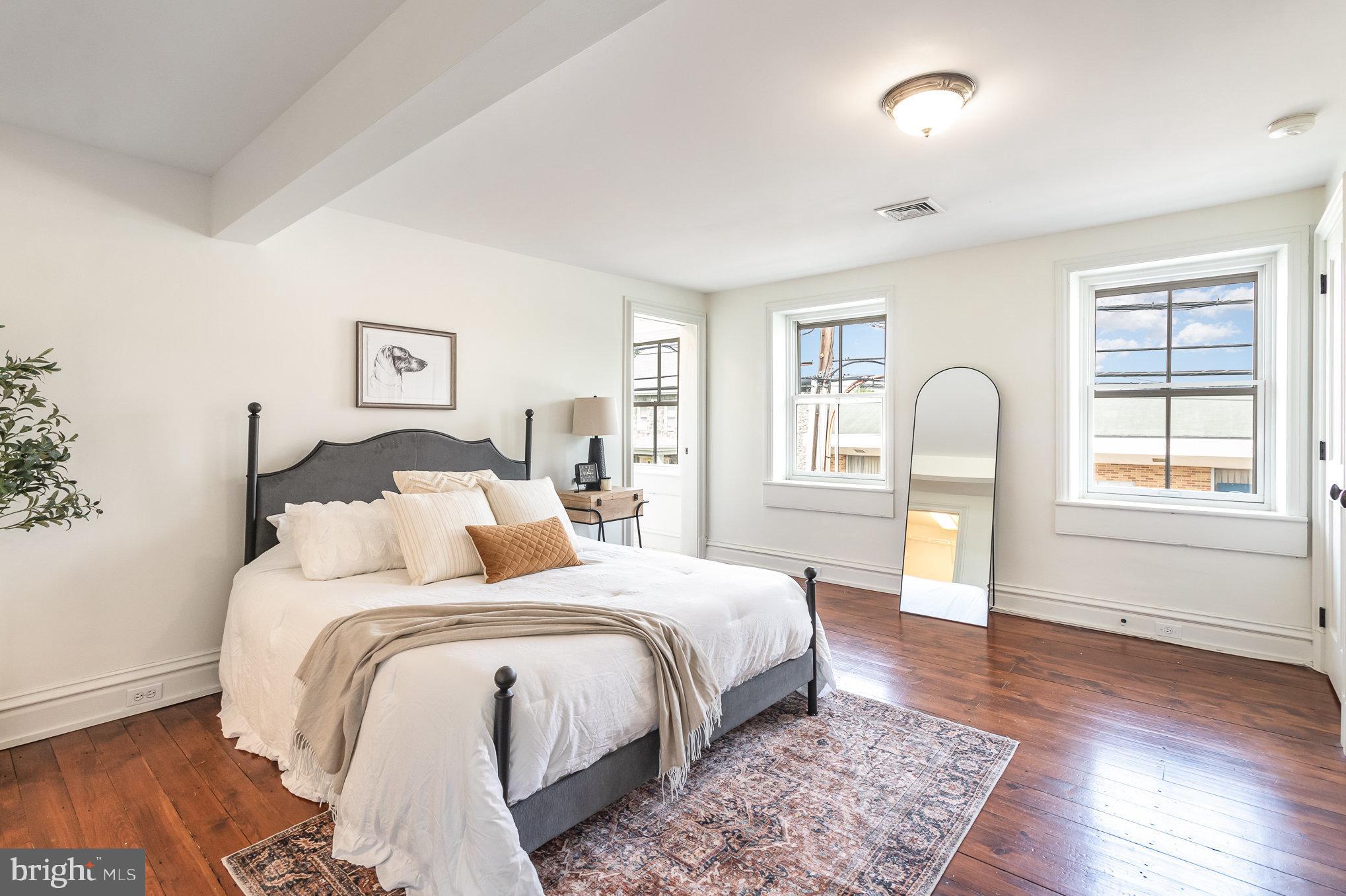 308 East Derry Road Hershey, PA 17033 - Photo 6 of 48 a bedroom with a bed and wooden floor
