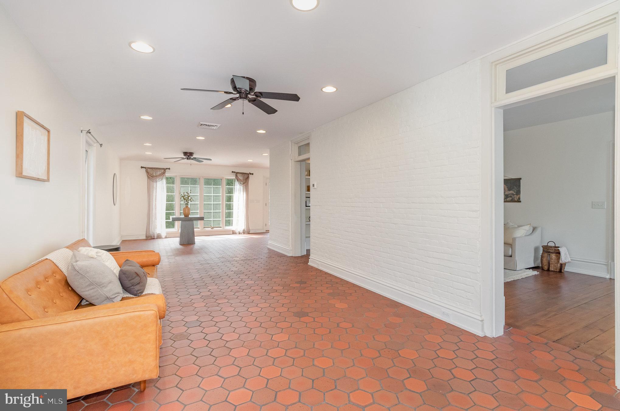 308 East Derry Road Hershey, PA 17033 - Photo 7 of 48 a living room with furniture and a window