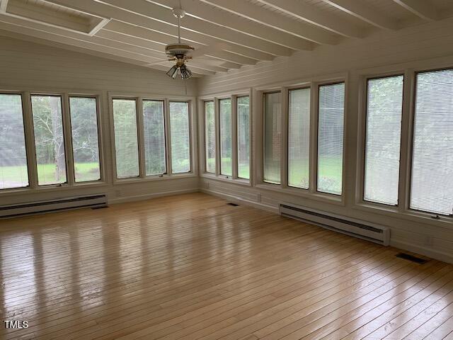 1003 Summerville Mamers Road Lillington, NC 27546 - Photo 14 of 44 a view of an empty room with wooden floor and a window