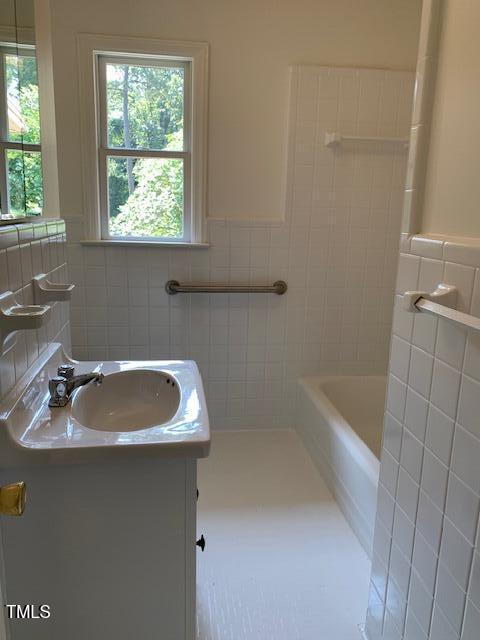 1003 Summerville Mamers Road Lillington, NC 27546 - Photo 22 of 44 a bathroom with a sink and bathtub