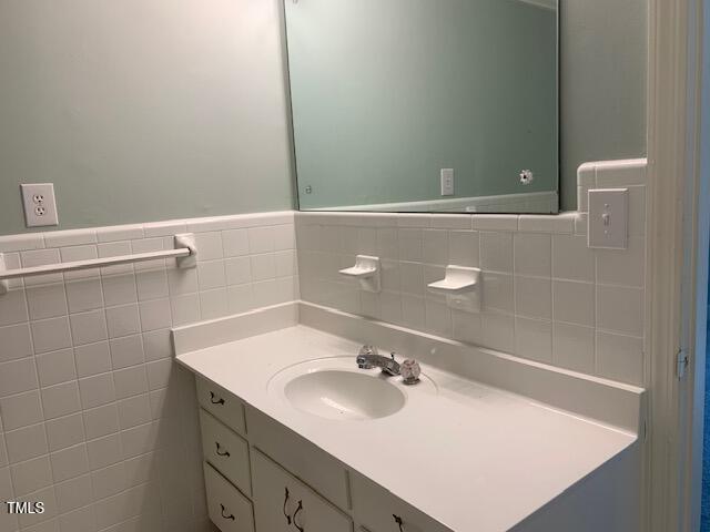 1003 Summerville Mamers Road Lillington, NC 27546 - Photo 27 of 44 a bathroom with a sink and a mirror
