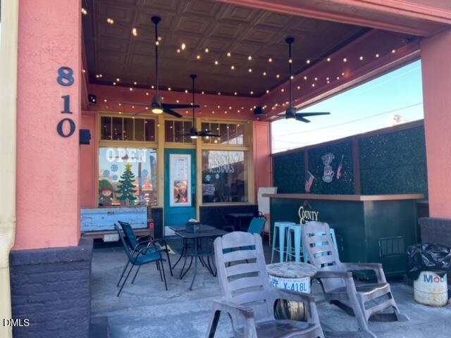 1003 Summerville Mamers Road Lillington, NC 27546 - Photo 40 of 44 a kitchen with a table and chairs in it