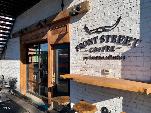 1003 Summerville Mamers Road Lillington, NC 27546 - Photo 42 of 44 a front view of a building with entryway