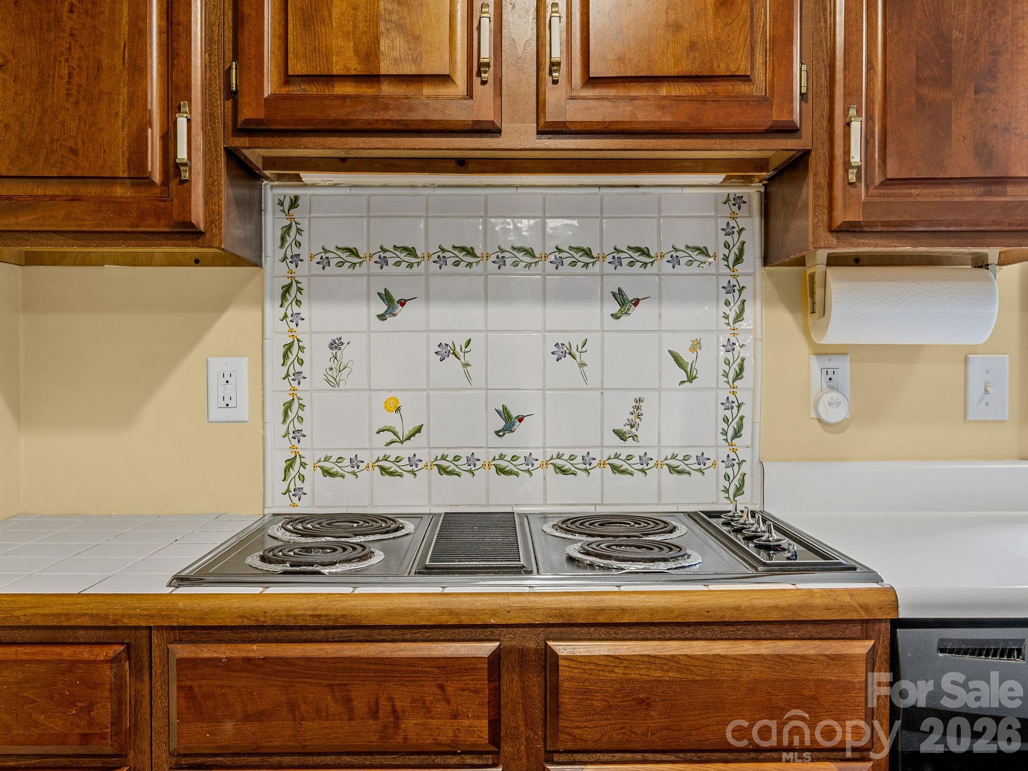 140 Meadowlark Drive Tryon, NC 28782 - Photo 11 of 45 a stove top oven sitting inside of a kitchen