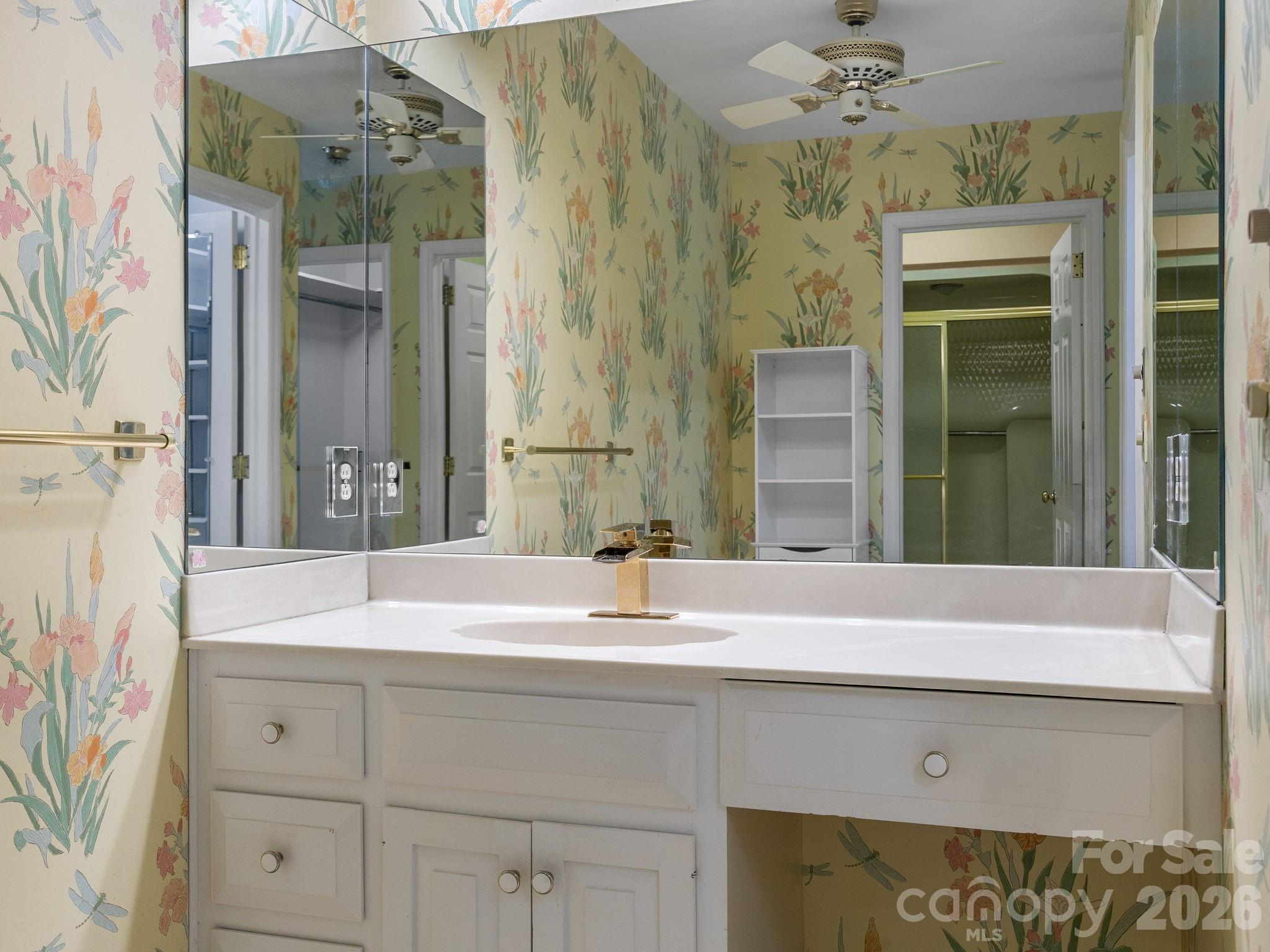 140 Meadowlark Drive Tryon, NC 28782 - Photo 22 of 45 a bathroom with a sink and a mirror