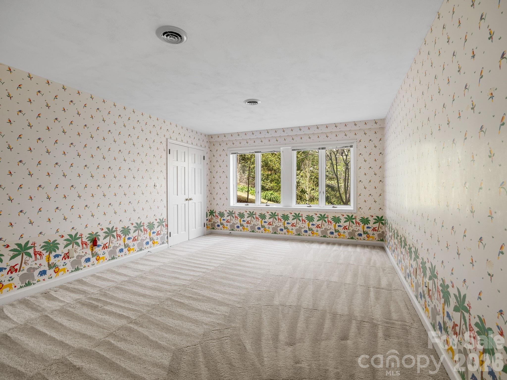 140 Meadowlark Drive Tryon, NC 28782 - Photo 31 of 45 a view of an empty room with a window
