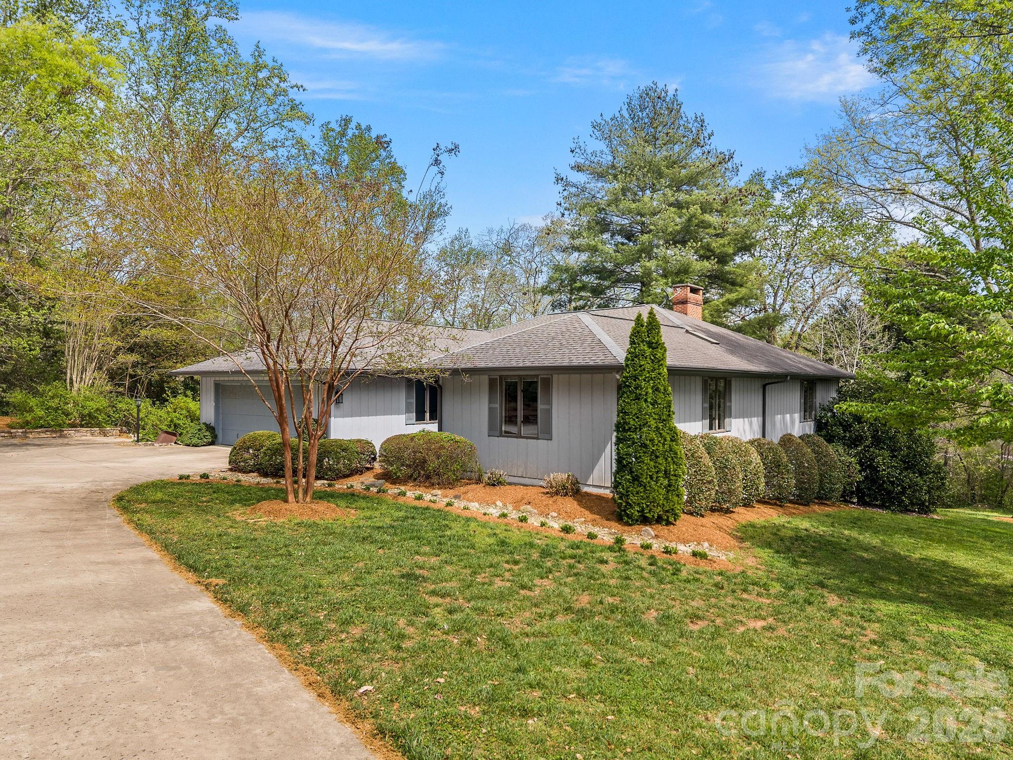140 Meadowlark Drive Tryon, NC 28782 - Photo 38 of 45 a front view of house with yard and trees