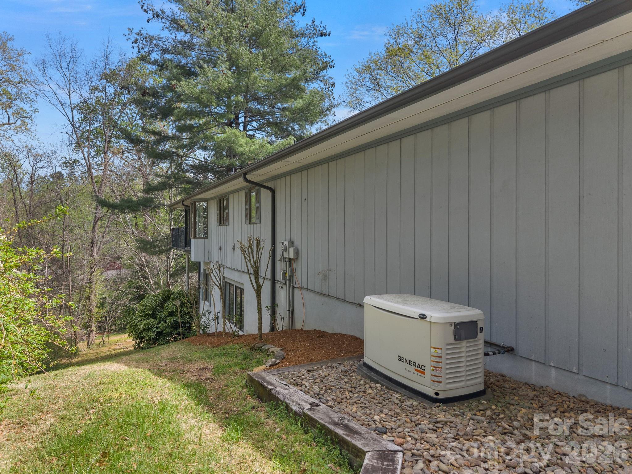 140 Meadowlark Drive Tryon, NC 28782 - Photo 43 of 45 a view of a back yard of the house
