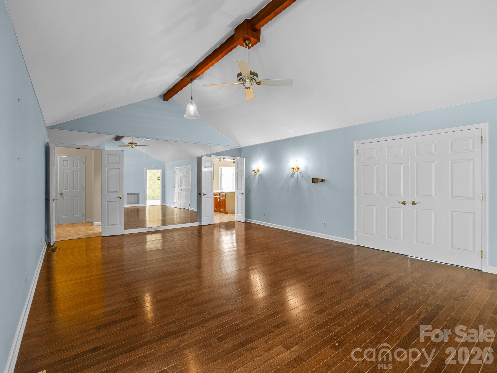 140 Meadowlark Drive Tryon, NC 28782 - Photo 8 of 45 a view of an empty room with wooden floor and a window