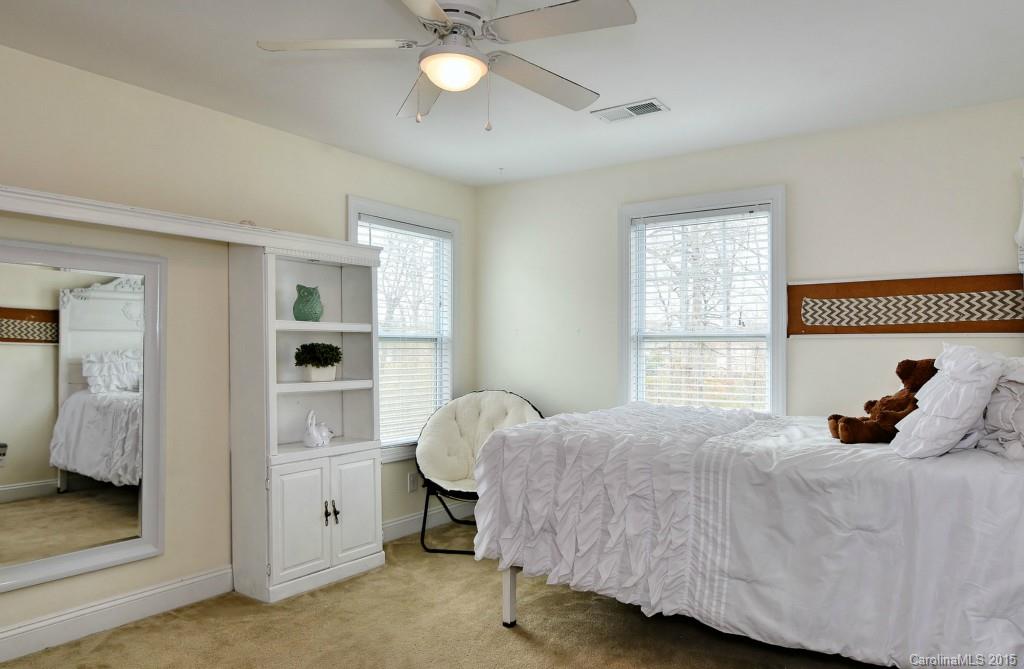 1004 Ridgehaven Road Waxhaw, NC 28173 - Photo 13 of 24 a bedroom with a bed and a window