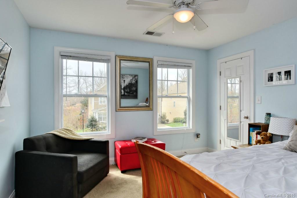 1004 Ridgehaven Road Waxhaw, NC 28173 - Photo 15 of 24 a bedroom with a bed and window