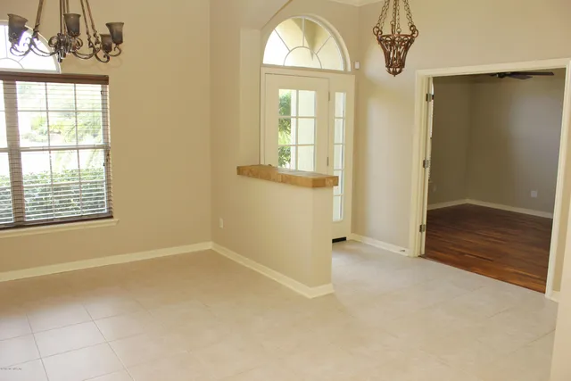 an empty room that has a window