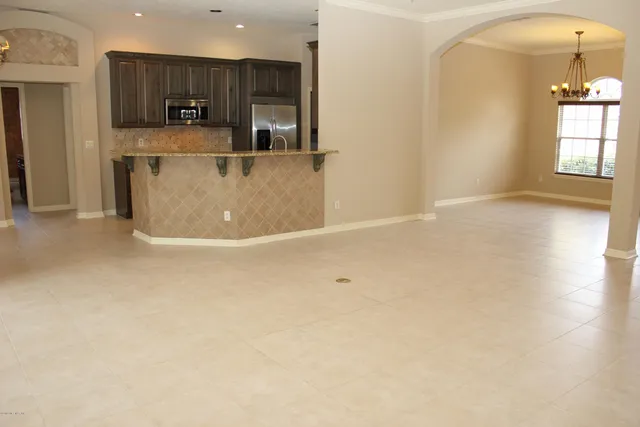 a view of a kitchen with a sink and dishwasher