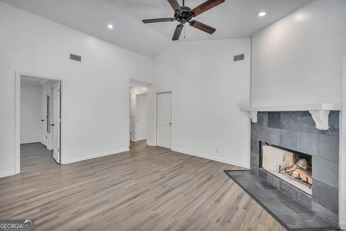 3 Bay Tree Court West St. Simons, GA 31522 - Photo 22 of 36 a view of an empty room and wooden floor