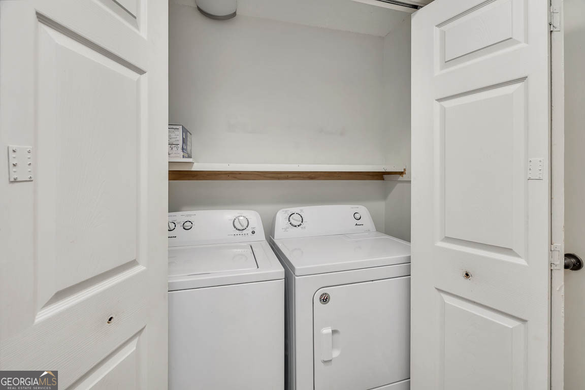3 Bay Tree Court West St. Simons, GA 31522 - Photo 29 of 36 a utility room with dryer and washer