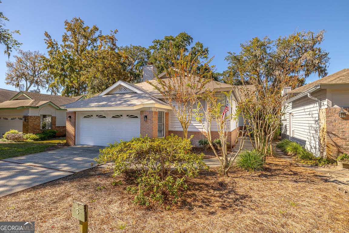 3 Bay Tree Court West St. Simons, GA 31522 - Photo 3 of 36 a view of a house with a yard