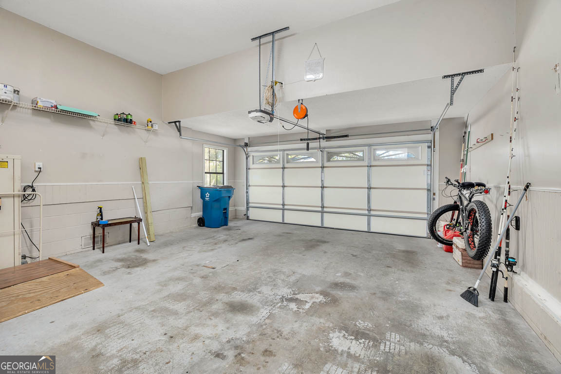 3 Bay Tree Court West St. Simons, GA 31522 - Photo 31 of 36 a view of a garage with rack and bicycle