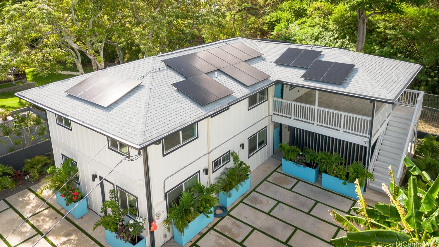 437 Kawailoa Road Kailua, HI 96734 - Photo 2 of 16 a aerial view of a house with a yard