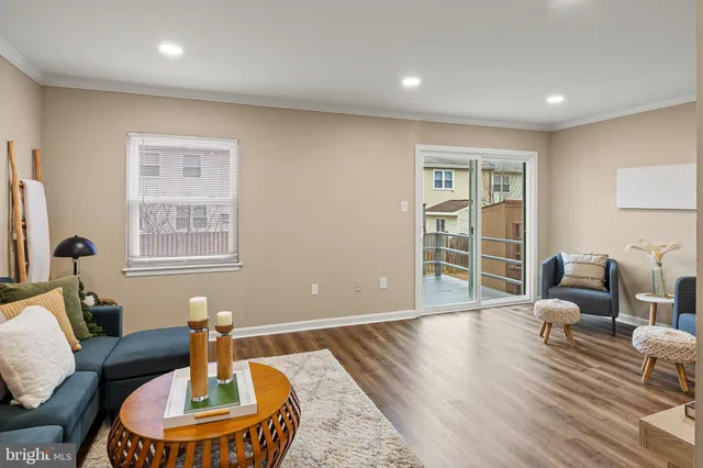 a kitchen with a sink a stove and cabinets