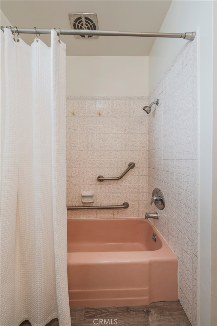 1241 South Walnut Street Anaheim, CA 92802 - Photo 28 of 36 a bathroom with a bathtub and a shower