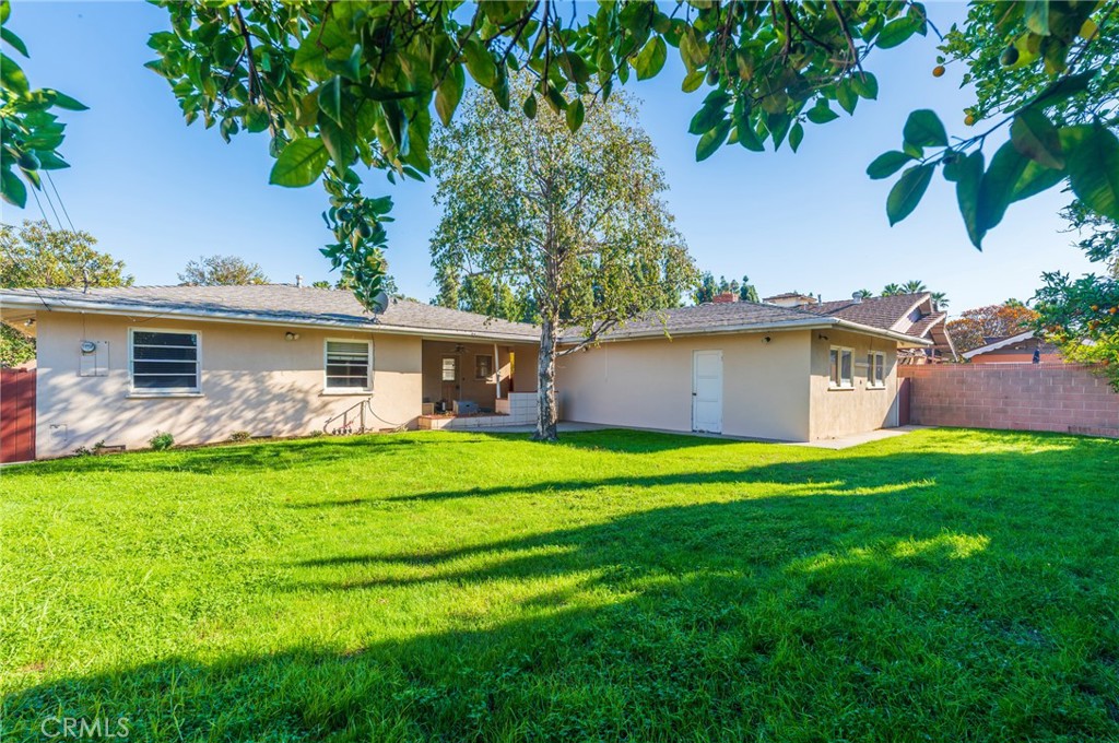1241 South Walnut Street Anaheim, CA 92802 - Photo 34 of 36 a front view of a house with garden