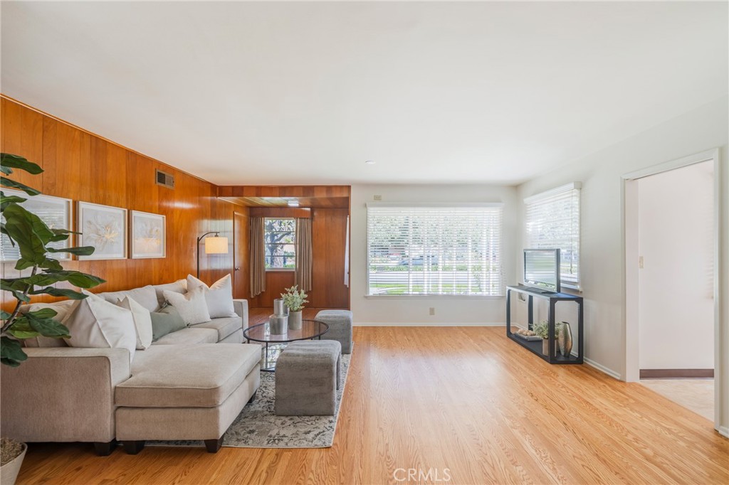 1241 South Walnut Street Anaheim, CA 92802 - Photo 6 of 36 a living room with furniture and a large window
