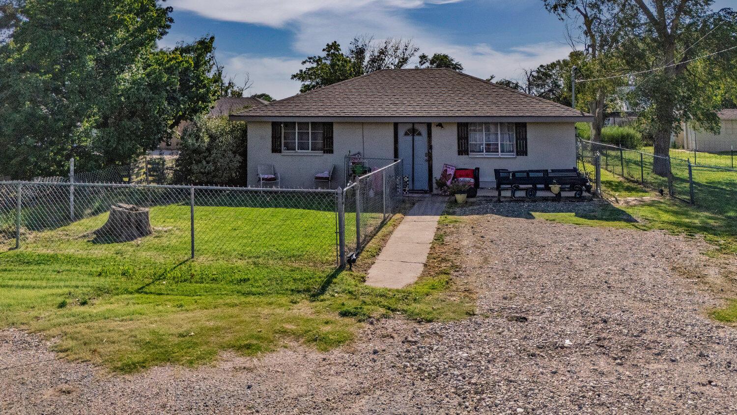 3601 Beacon Road Amarillo, TX 79118 - Photo 13 of 15 a view of a house with a yard patio and a slide