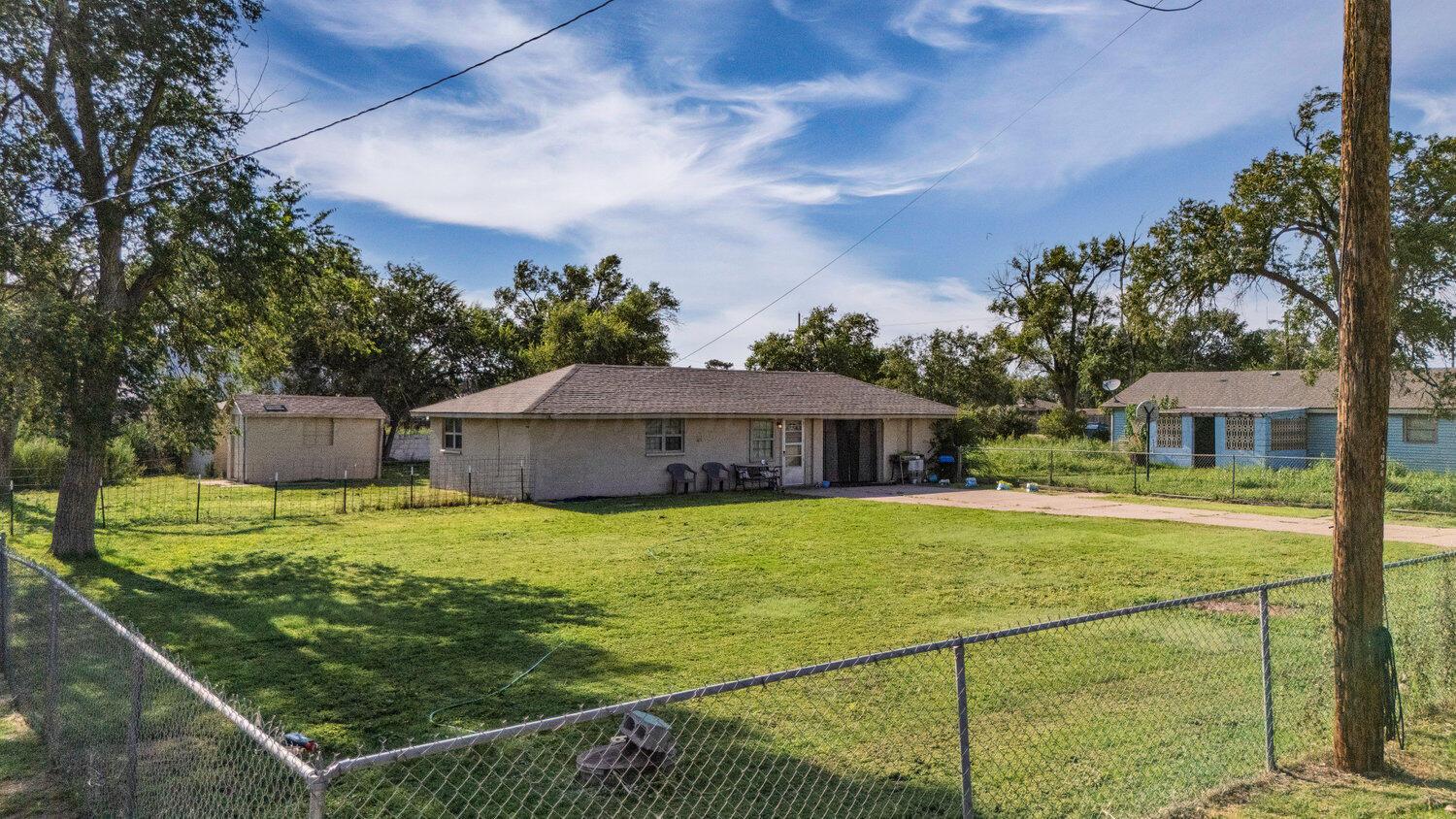 3601 Beacon Road Amarillo, TX 79118 - Photo 7 of 15 a view of a house with backyard and garden