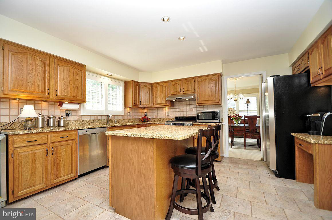 2906 Thornbrook Road Ellicott City, MD 21042 - Photo 3 of 30 Granite Counters + Stone Floor