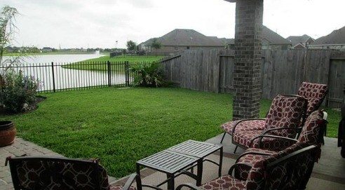 9111 Turnbull Lane Rosenberg, TX 77469 - Photo 27 of 29 a view of a patio with chair and table