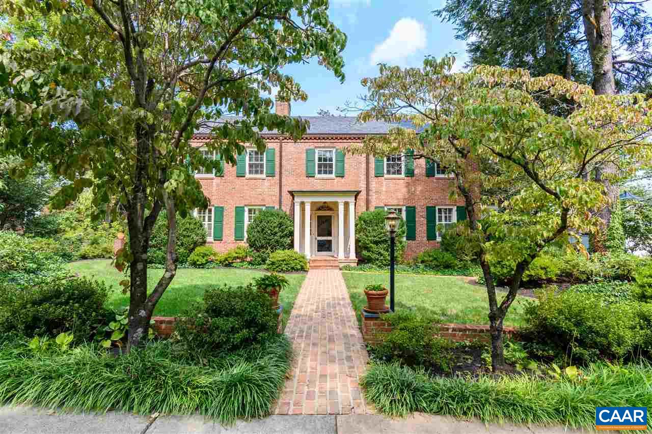 1931 Thomson Road Charlottesville, VA 22903 - Photo 1 of 42 a front view of a house with yard and garden