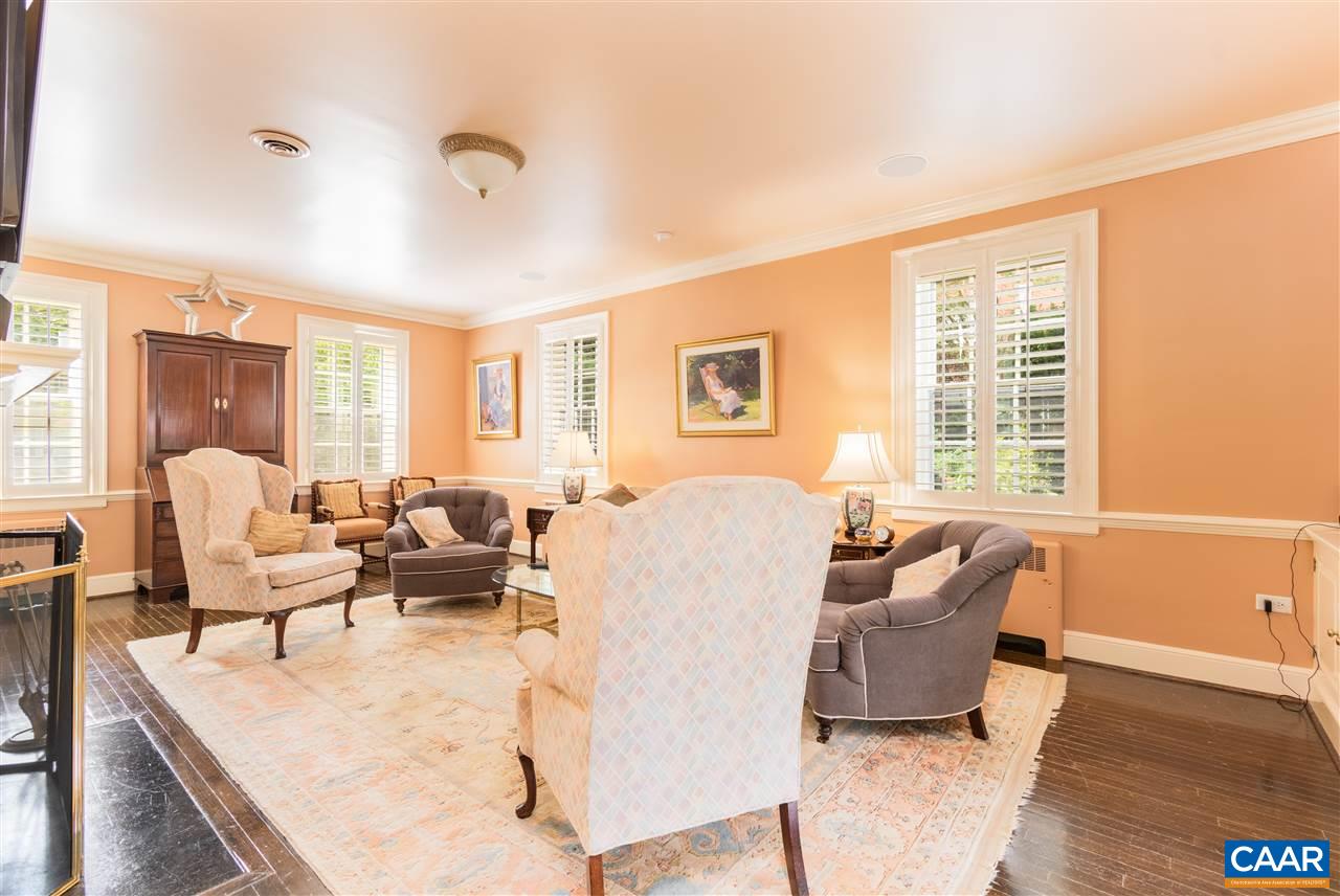 1931 Thomson Road Charlottesville, VA 22903 - Photo 12 of 42 a living room with furniture and a large window