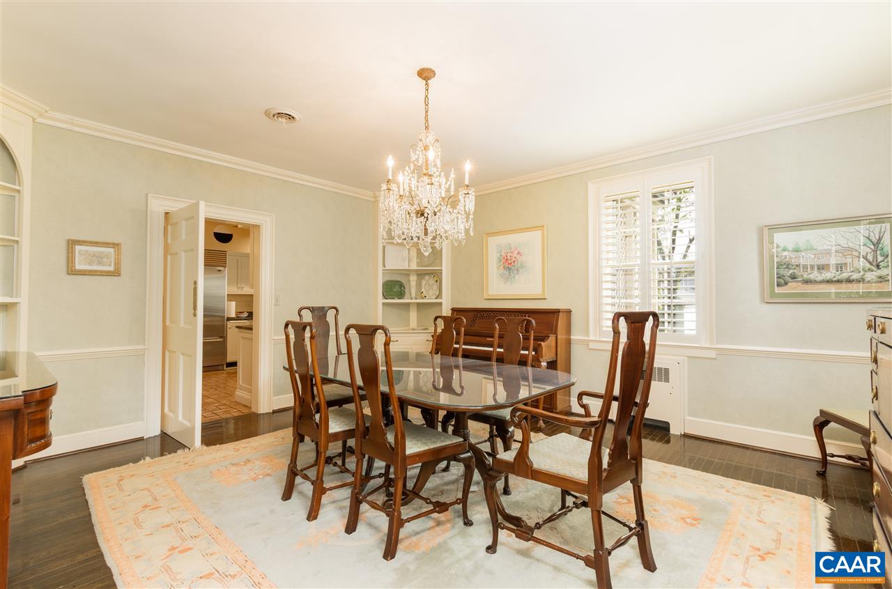 1931 Thomson Road Charlottesville, VA 22903 - Photo 13 of 42 a view of a dining room with furniture and chandelier