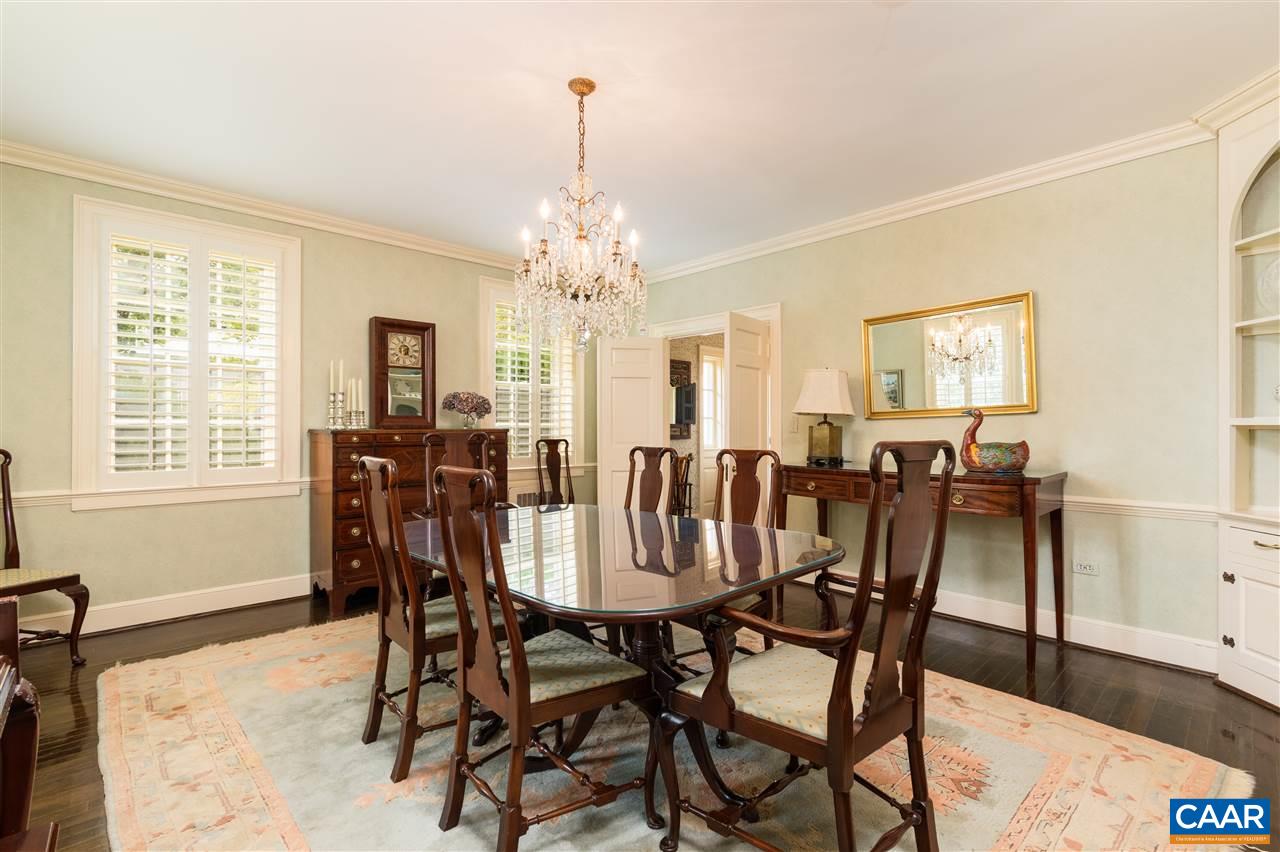 1931 Thomson Road Charlottesville, VA 22903 - Photo 14 of 42 a view of a dining room with furniture and chandelier