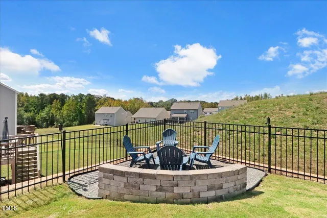 a view of a house with a big yard