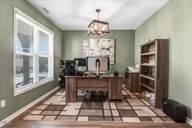a front view of a house with glass windows