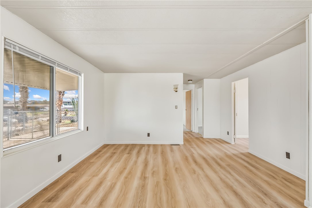 1267 Wilson Road Bullhead City, AZ 86442 - Photo 18 of 37 a view of room with window and hardwood floor
