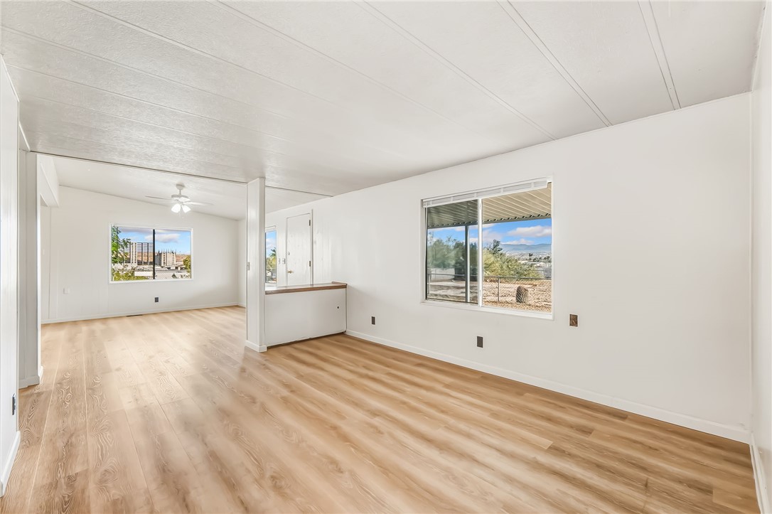 1267 Wilson Road Bullhead City, AZ 86442 - Photo 19 of 37 a view of an empty room with a window
