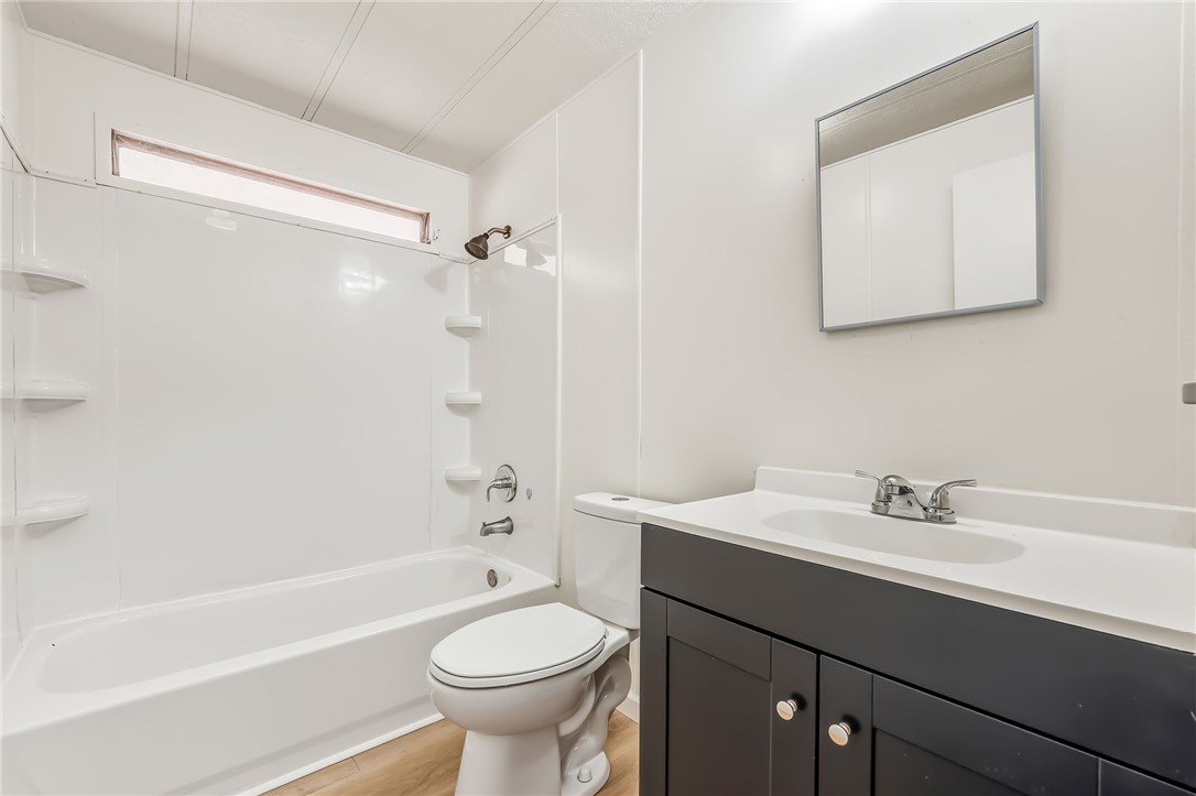 1267 Wilson Road Bullhead City, AZ 86442 - Photo 23 of 37 a bathroom with a sink a toilet and shower