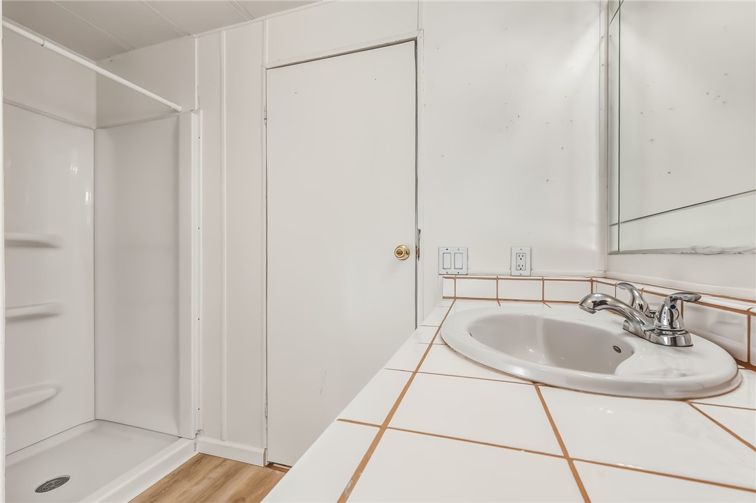 1267 Wilson Road Bullhead City, AZ 86442 - Photo 30 of 37 a bathroom with a sink and shower