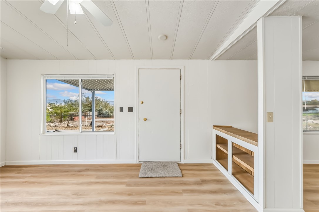 1267 Wilson Road Bullhead City, AZ 86442 - Photo 3 of 37 a view of a livingroom with an empty space and a window