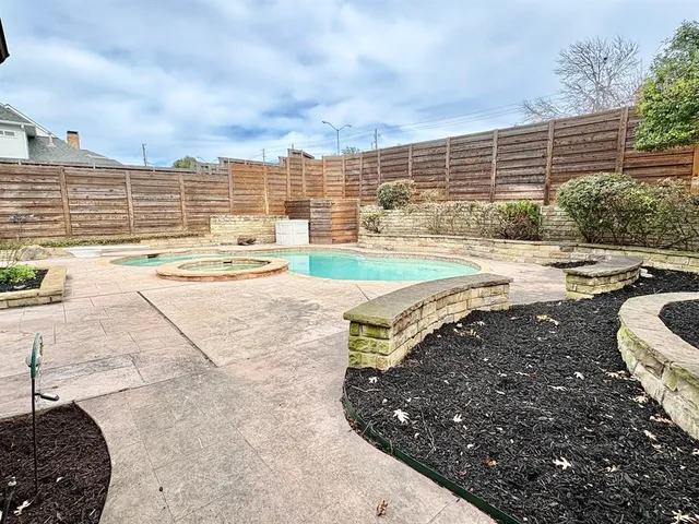 a view of a terrace with wooden floor and city view