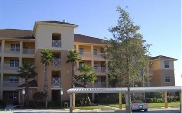 a front view of a building with street view